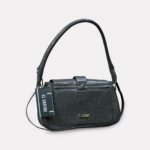 Stylish grey croco-patterned shoulder bag with gold-tone hardware and a detachable strap for versatile carrying options.