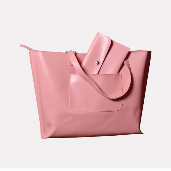 A stylish pink tote bag with a minimalist design, featuring sturdy handles and a spacious interior, perfect for everyday use.